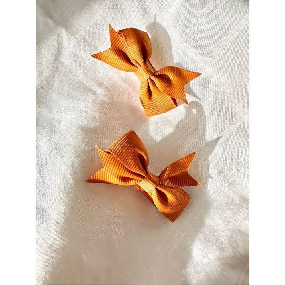 Orange color mini hair bows - for women, babies, dogs, or cats